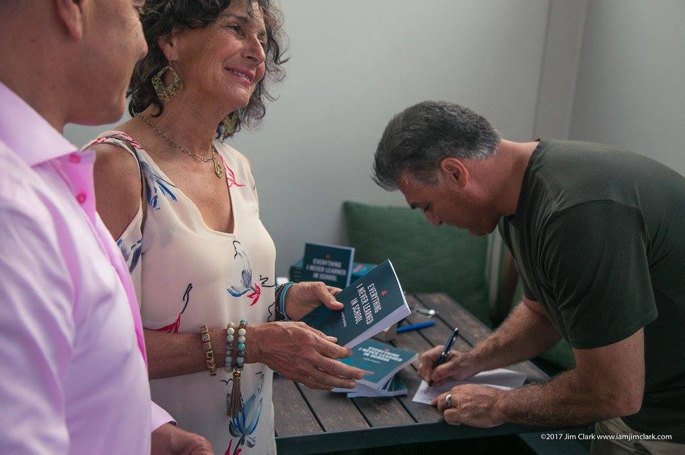 Darin Colucci signing his book Everything I Never Learned in School at DG + VIE event