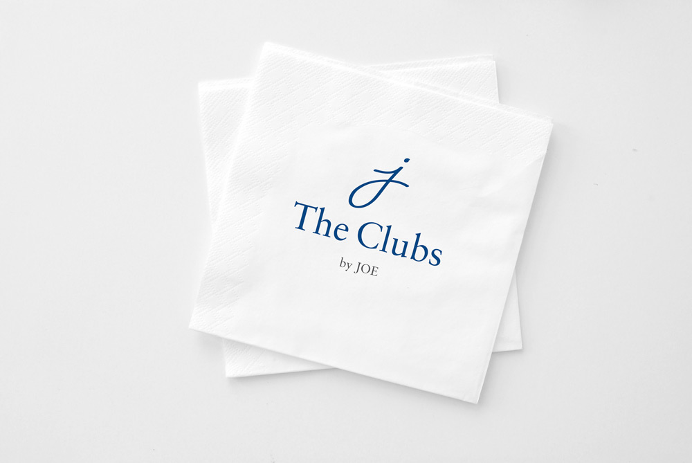 The Clubs by Joe logo on bar napkins